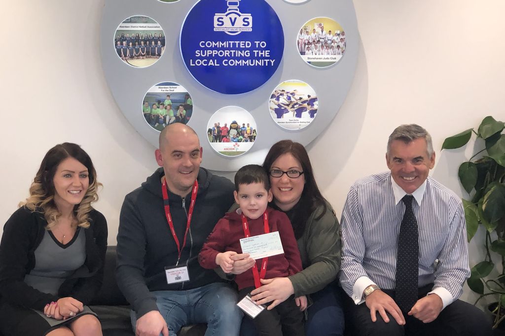 charity-presentation-Dravet-Syndrome SVS present a cheque for £1,123.75 to ‘Dravet Syndrome UK’.