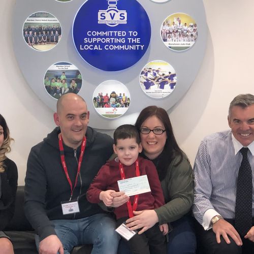SVS present a cheque for £1,123.75 to ‘Dravet Syndrome UK’.